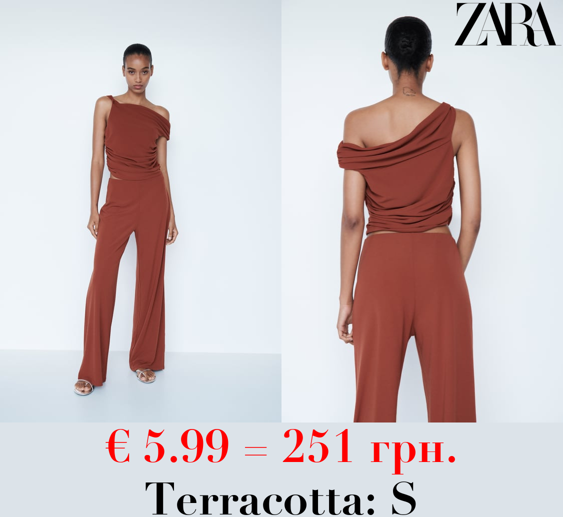 ASYMMETRIC DRAPED TOP