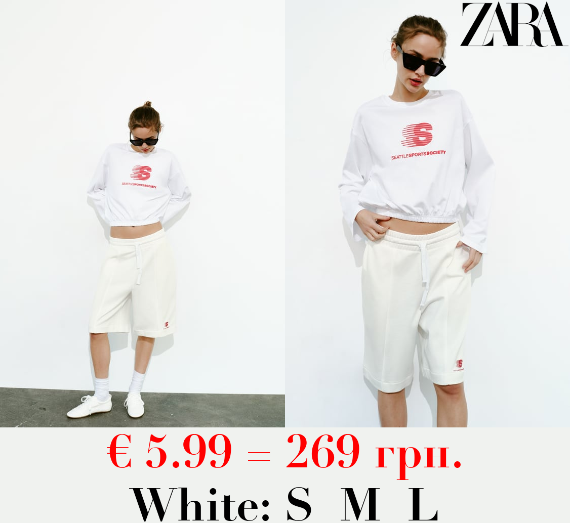 BERMUDA SHORTS WITH SLOGAN DETAIL