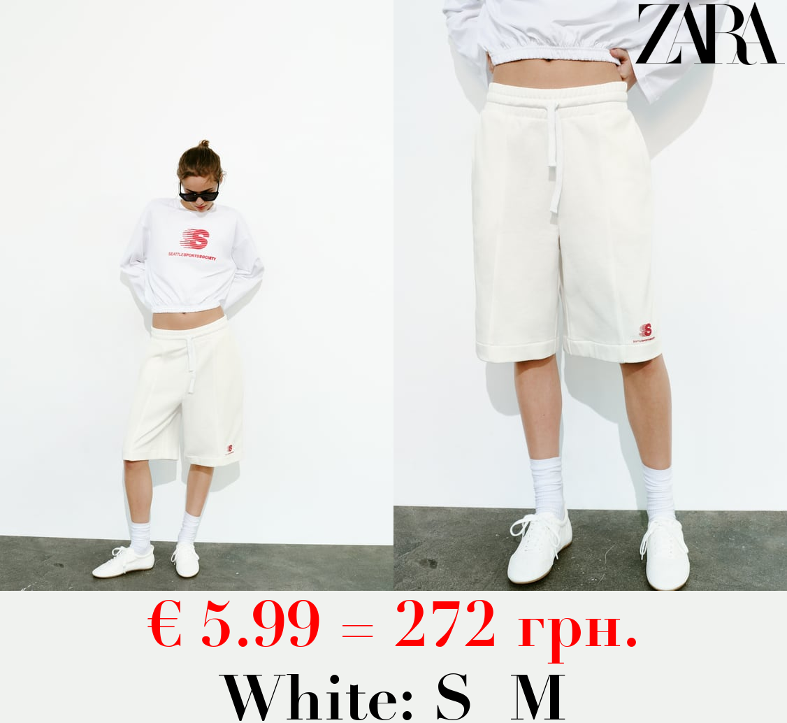 BERMUDA SHORTS WITH SLOGAN DETAIL