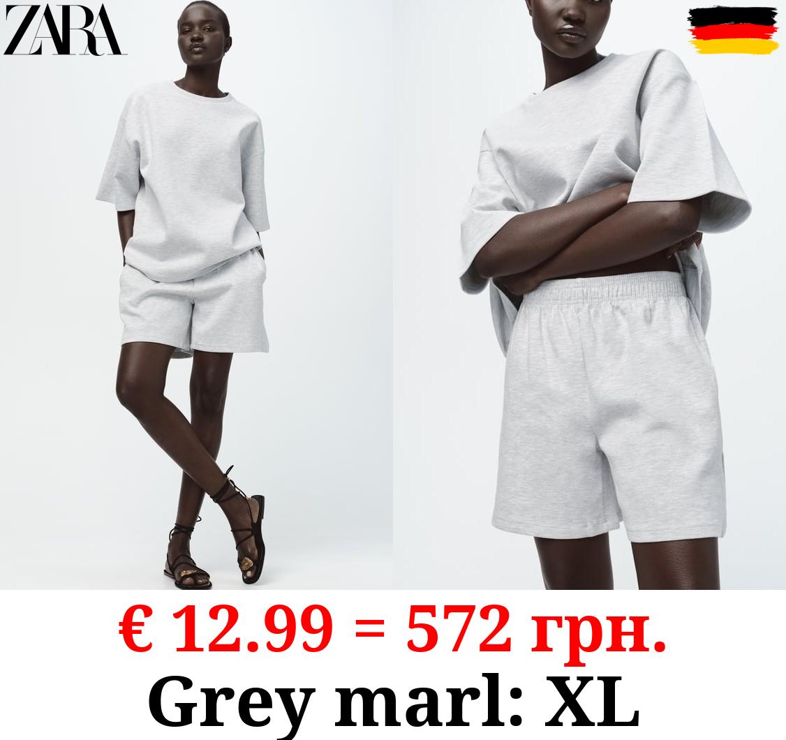 SHORT SLEEVE INTERLOCK SWEATSHIRT