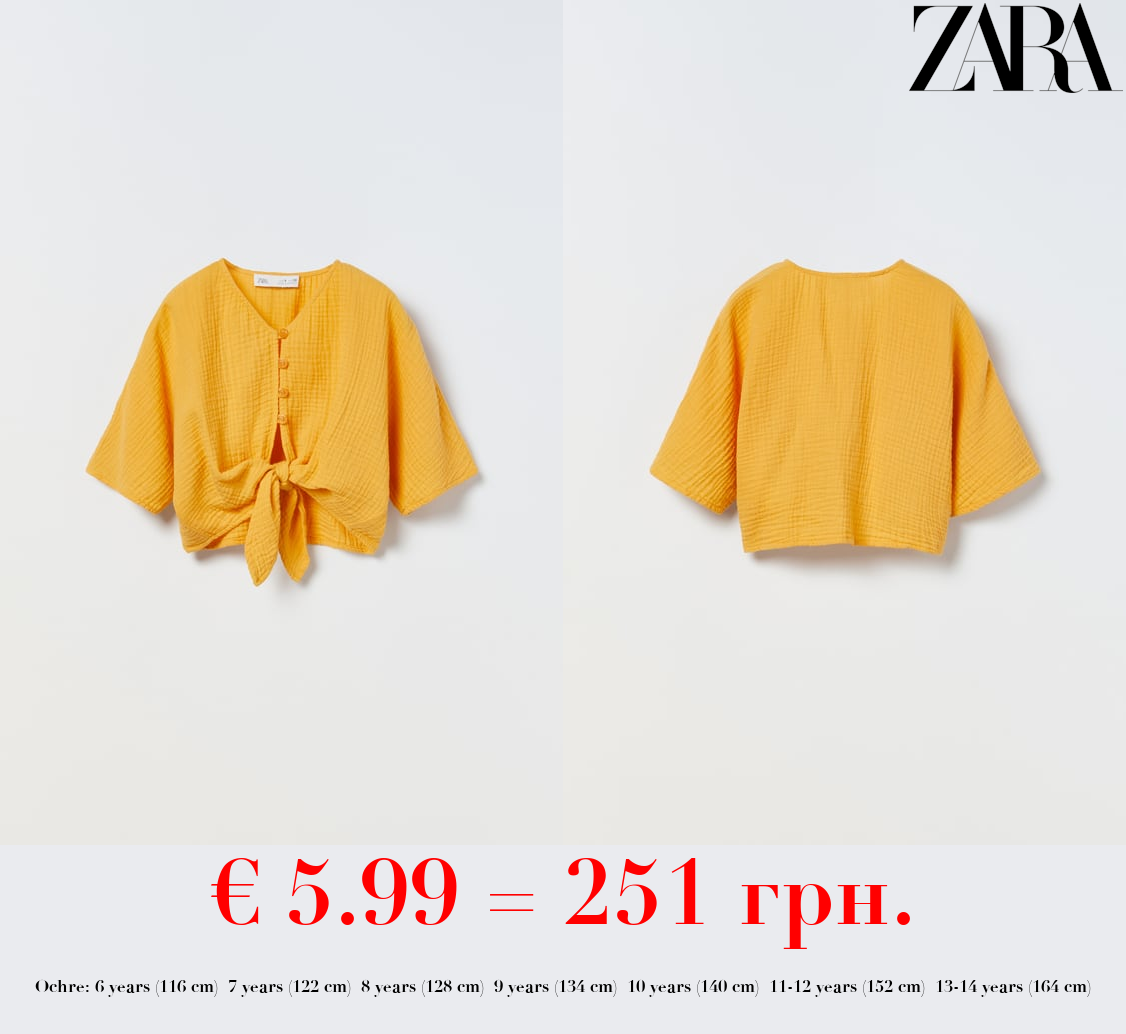 TEXTURED BLOUSE WITH KNOT