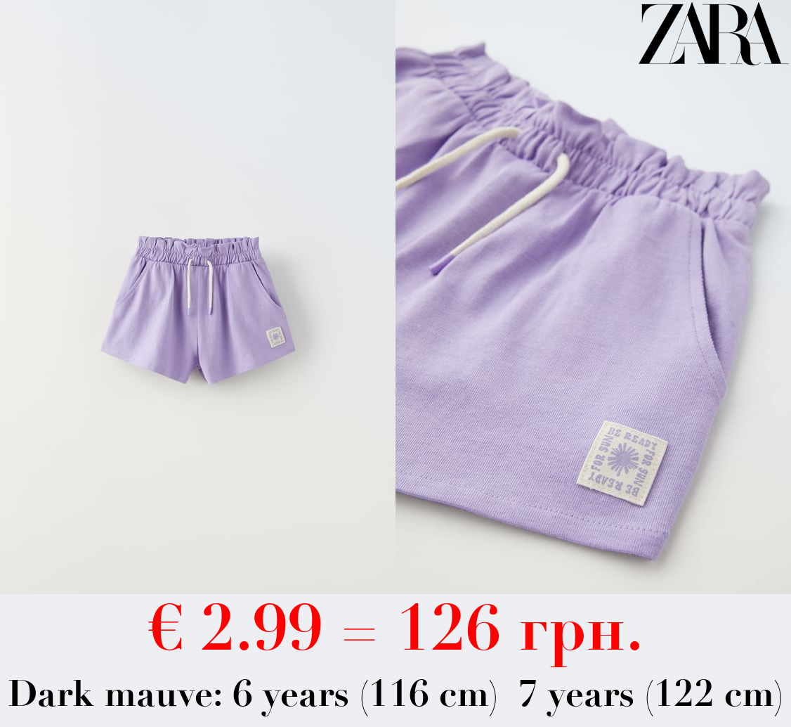 PLUSH BERMUDA SHORTS WITH LABEL DETAIL