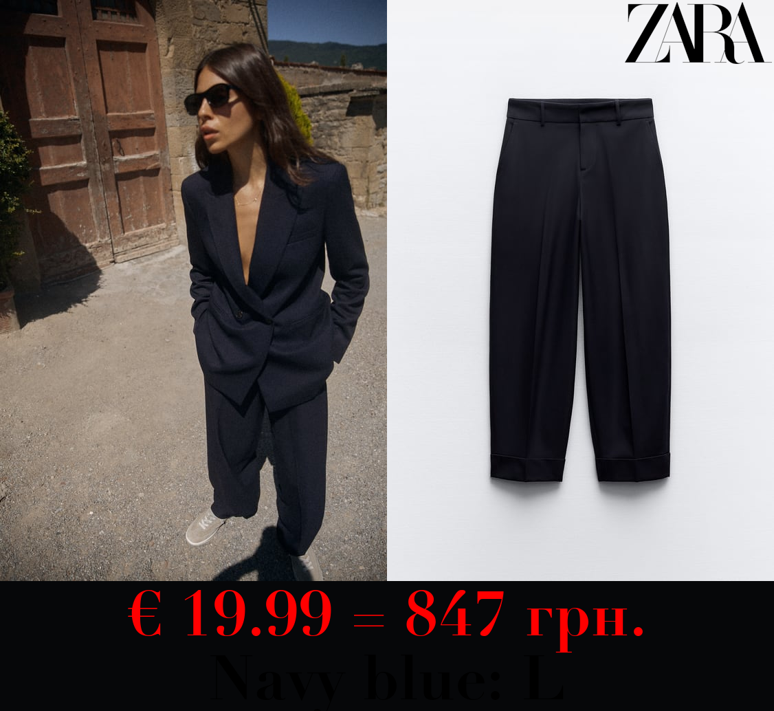 STRAIGHT-LEG TROUSERS WITH TURN-UP HEMS