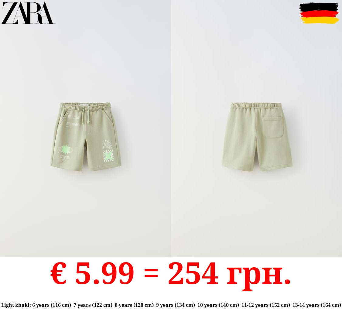 PLUSH BERMUDA SHORTS WITH NEON SLOGANS