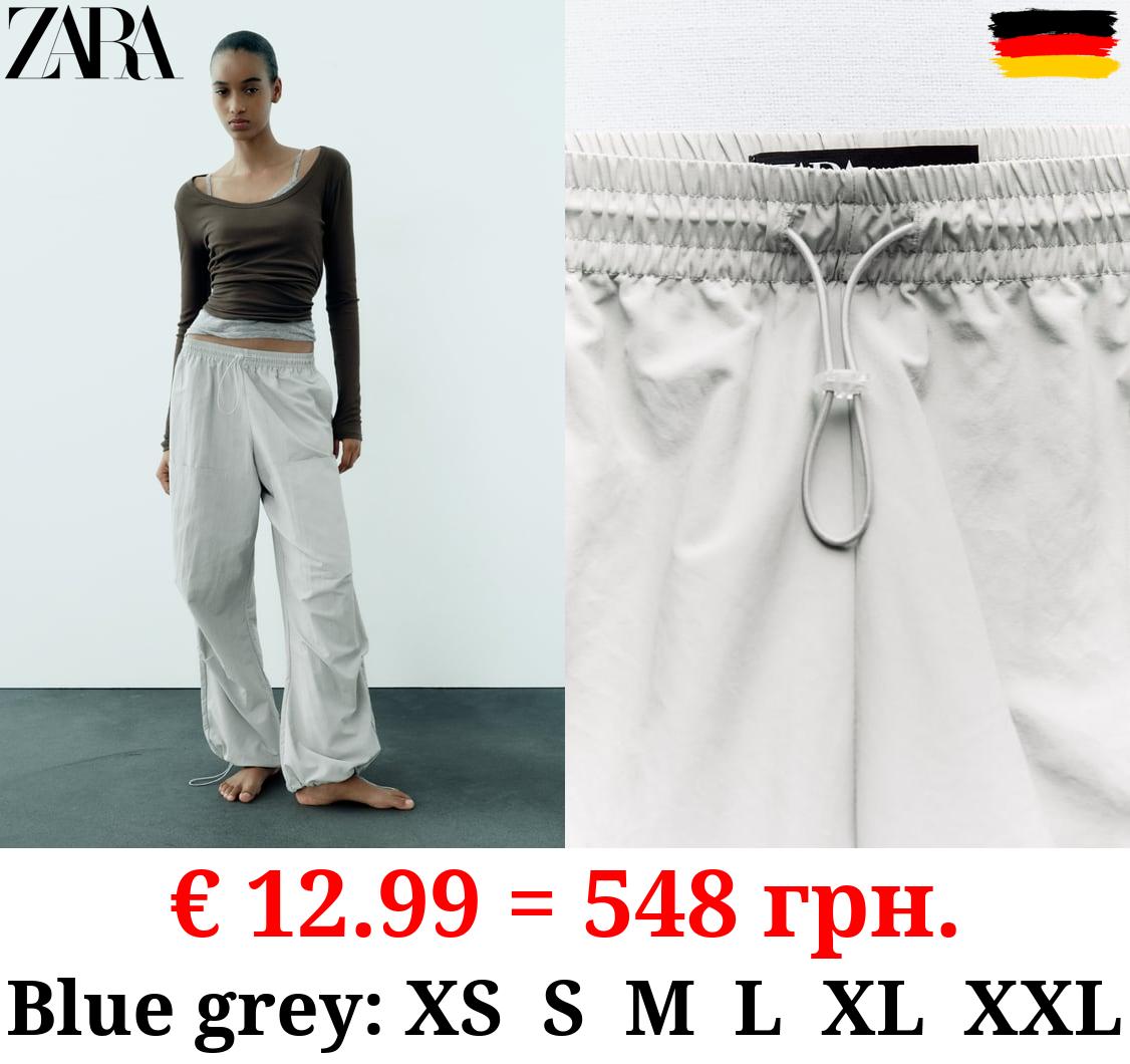 NYLON TROUSERS WITH POCKETS