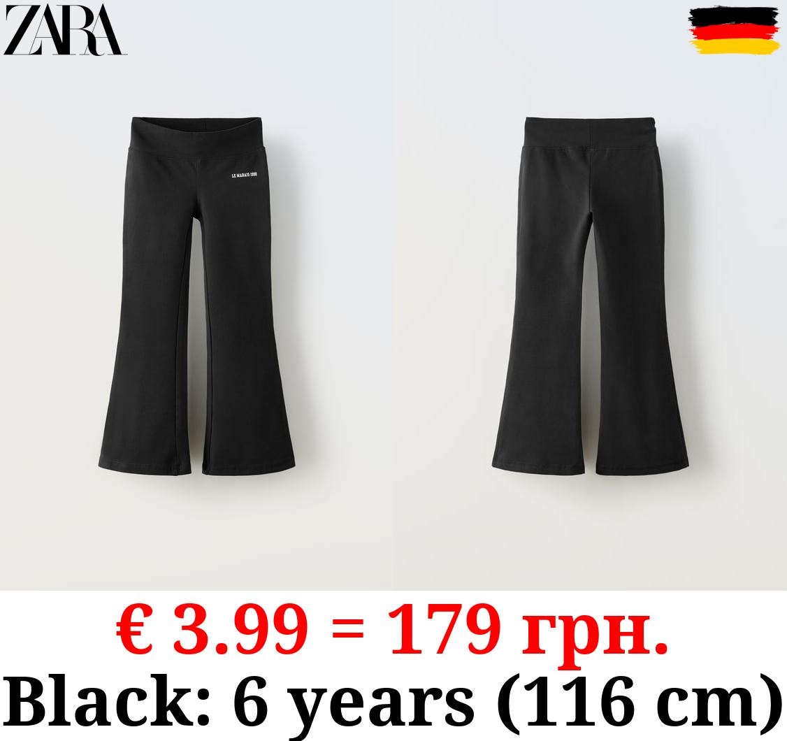 FLARED LEGGINGS WITH SLOGAN