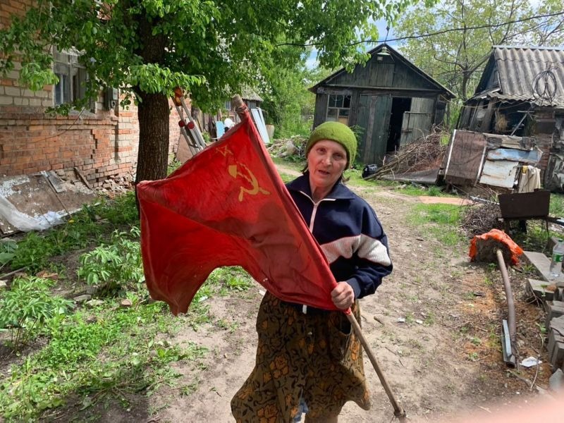 Old woman with soviet flag
