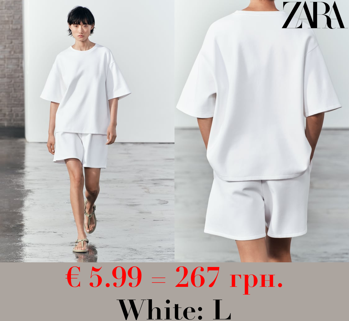 SHORT SLEEVE INTERLOCK SWEATSHIRT