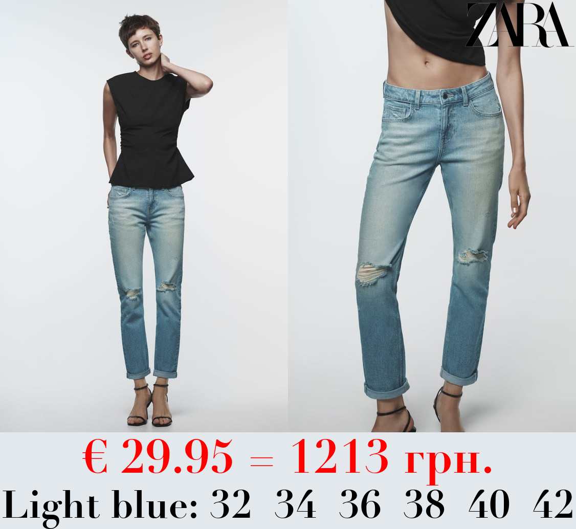 Z1975 RIPPED SPLIT-HEM LOW-RISE JEANS