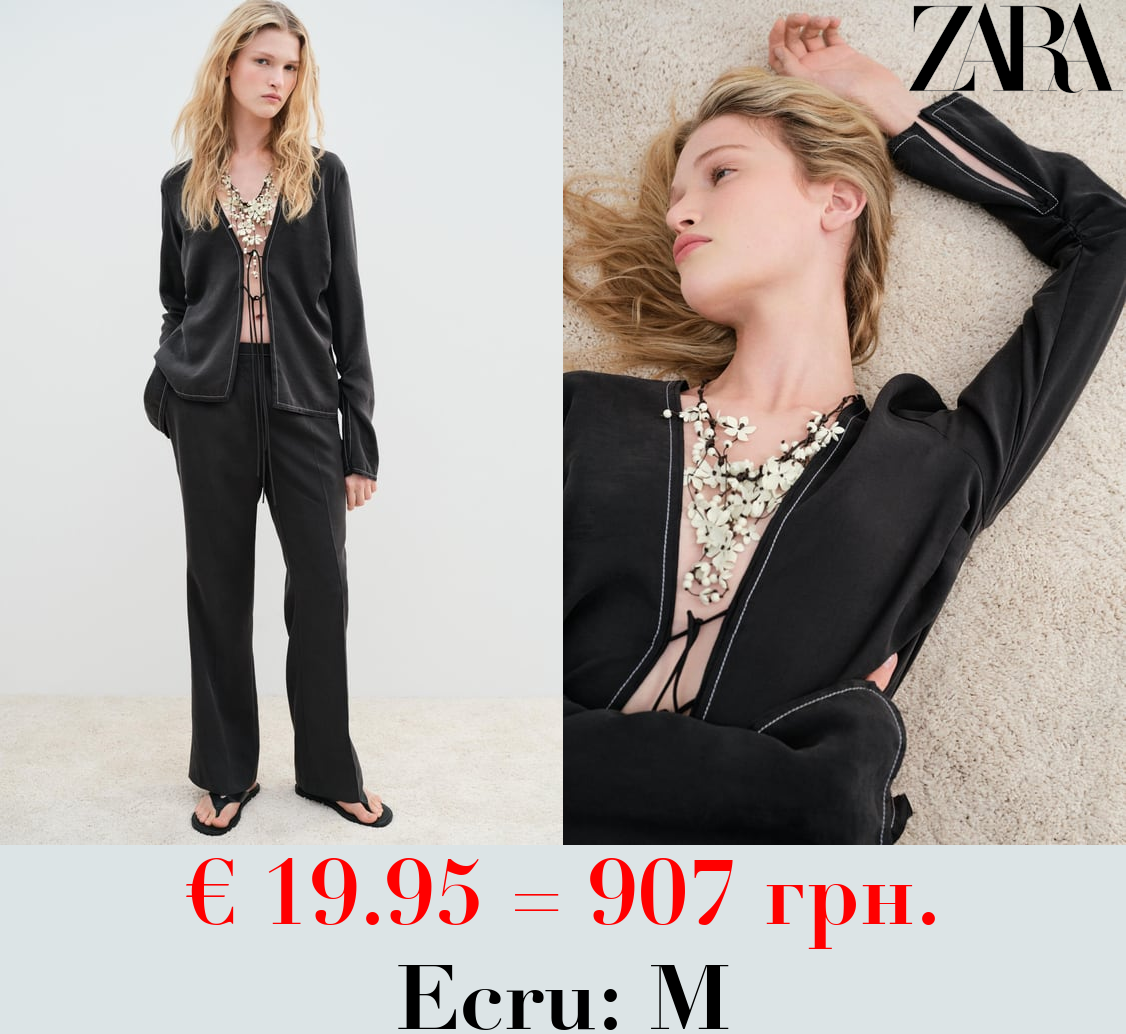 CASCADING FLORAL CORD NECKLACE