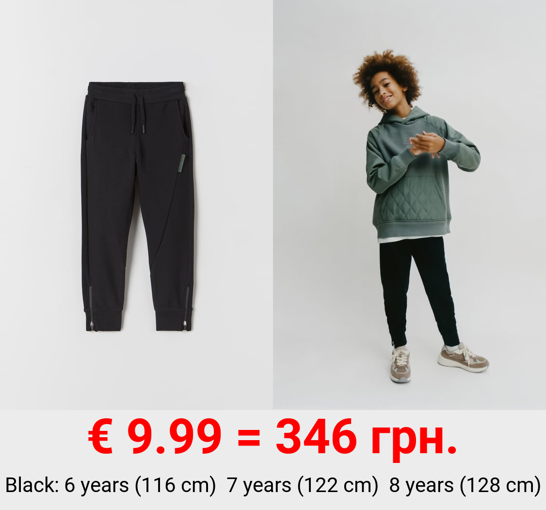 PLUSH JERSEY TROUSERS WITH ZIPS