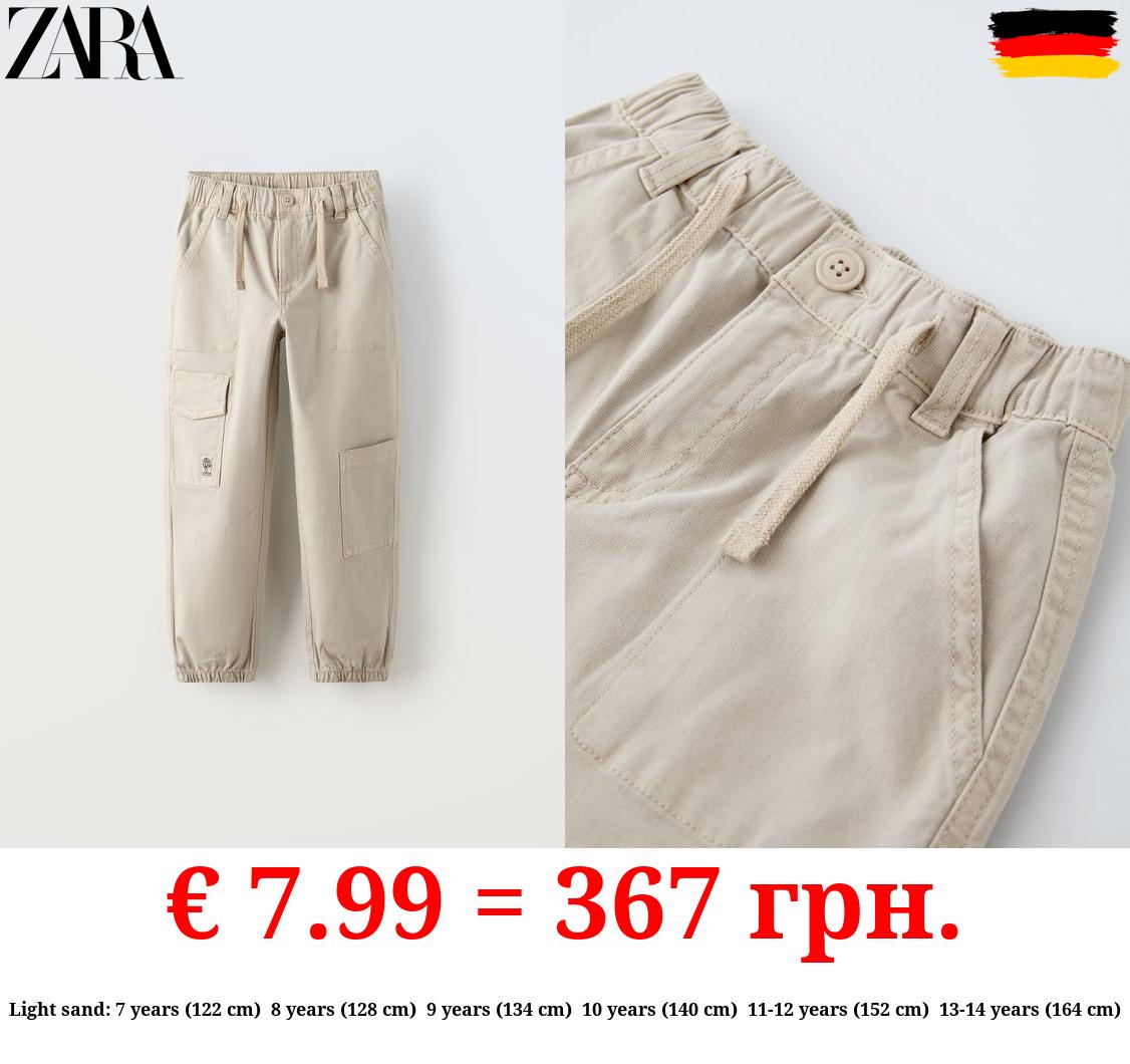 CANVAS TROUSERS WITH POCKETS