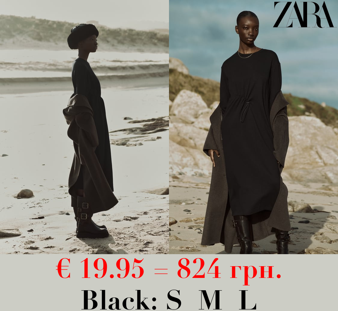 DRESS WITH GATHERED DETAIL AND STOPPER