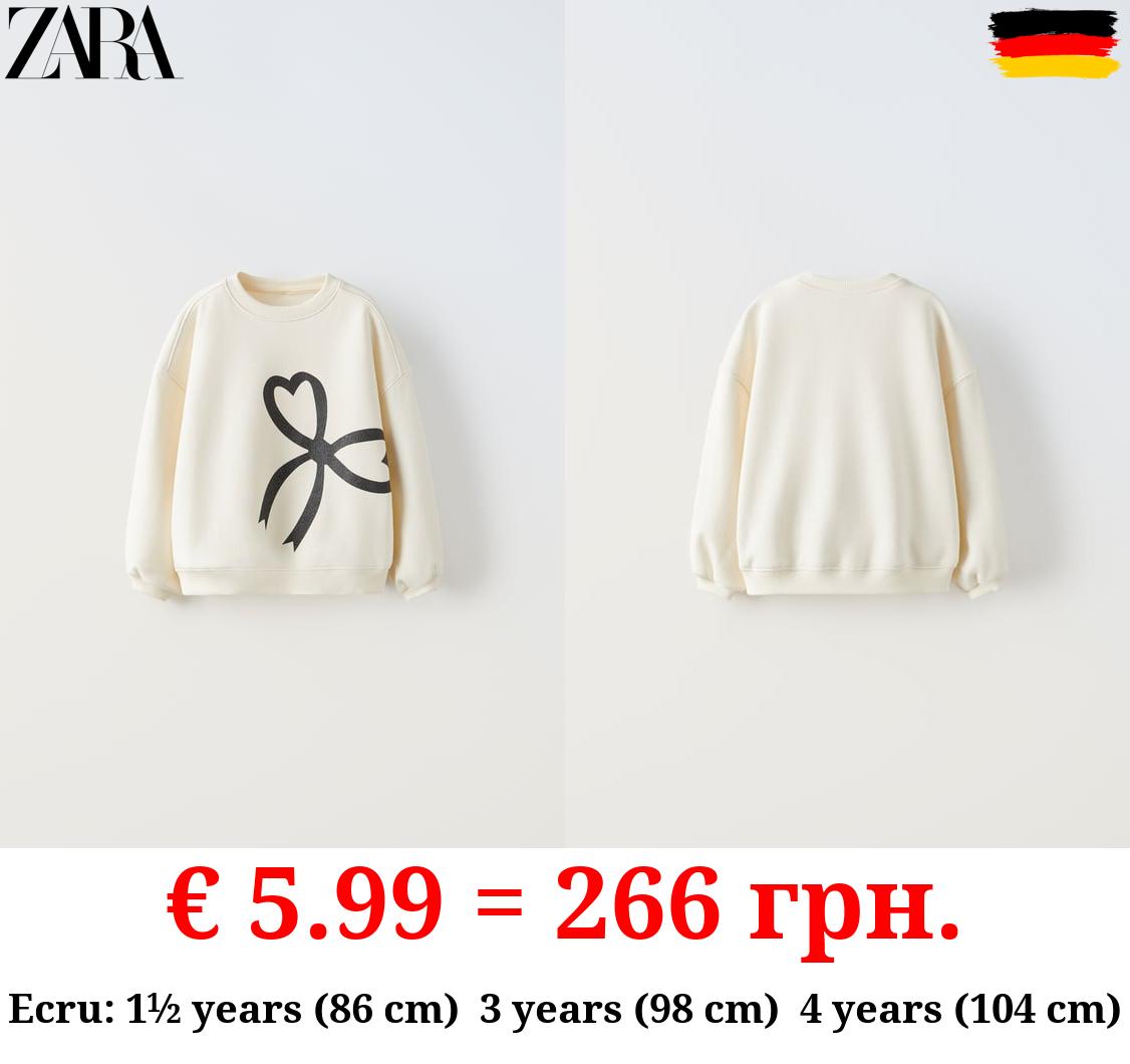 PRINTED SWEATSHIRT WITH SHINY BOW