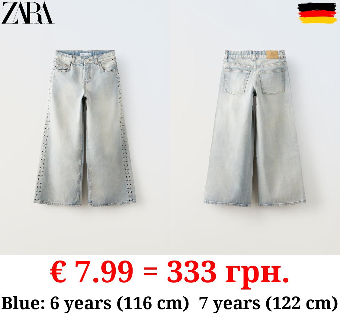 STUDDED FLARED JEANS