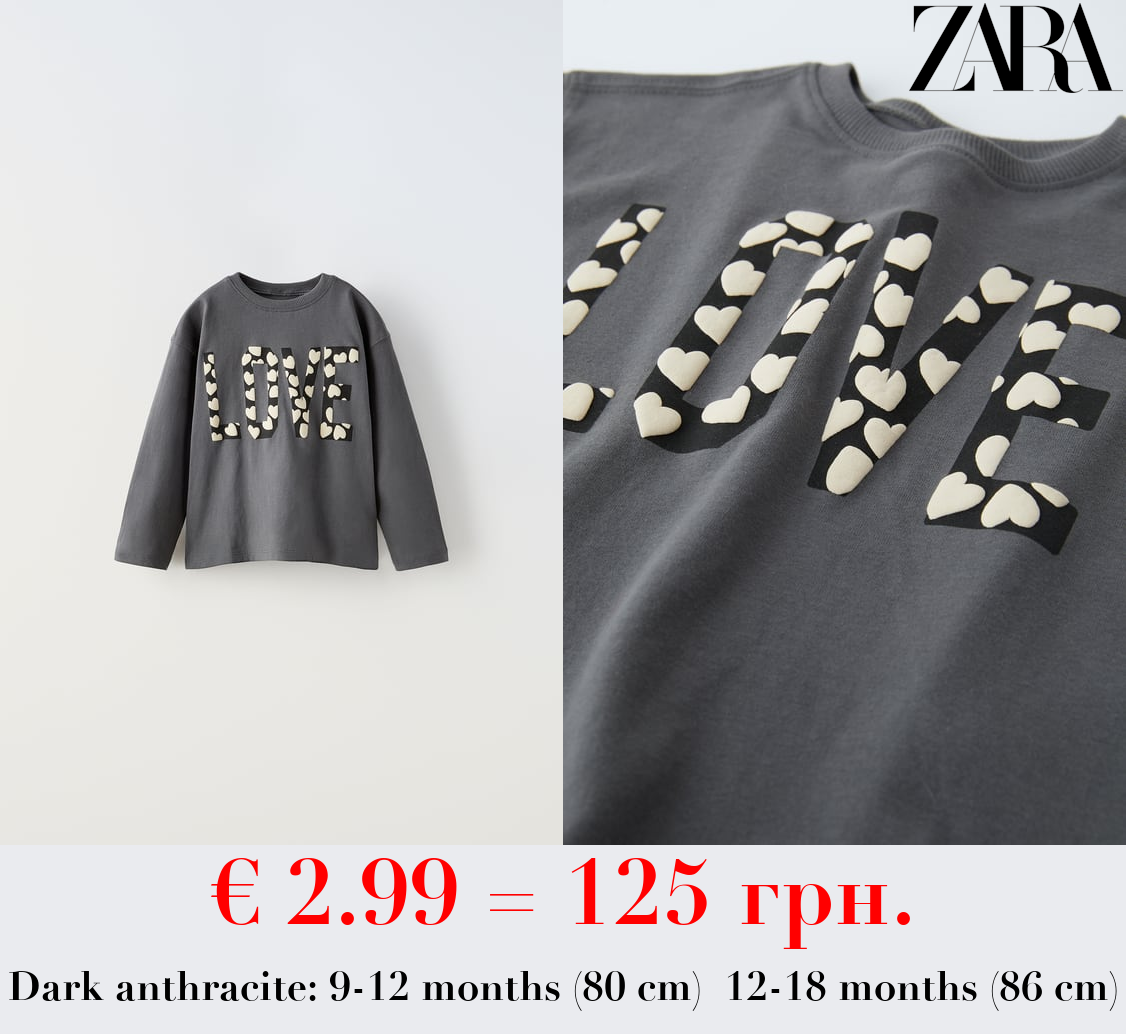 RAISED SLOGAN T-SHIRT