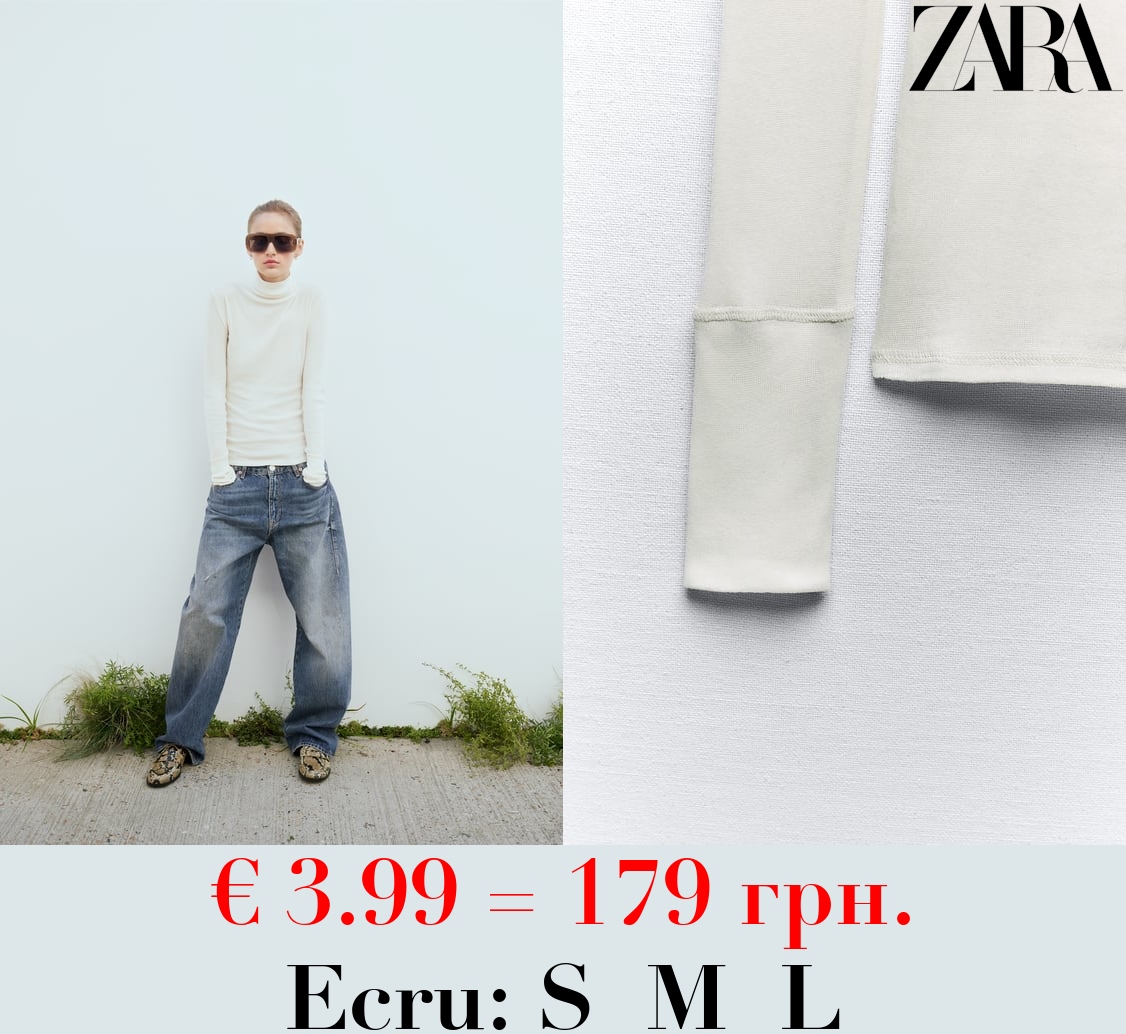 SEMI-SHEER DELICATE COTTON TOP WITH CUFFS AND SEAM DETAIL