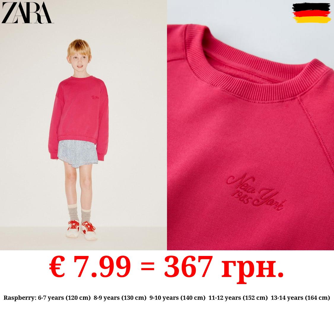 SWEATSHIRT WITH EMBROIDERED SLOGAN