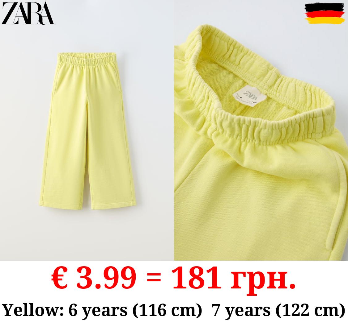 WIDE-LEG FADED-EFFECT JOGGING TROUSERS