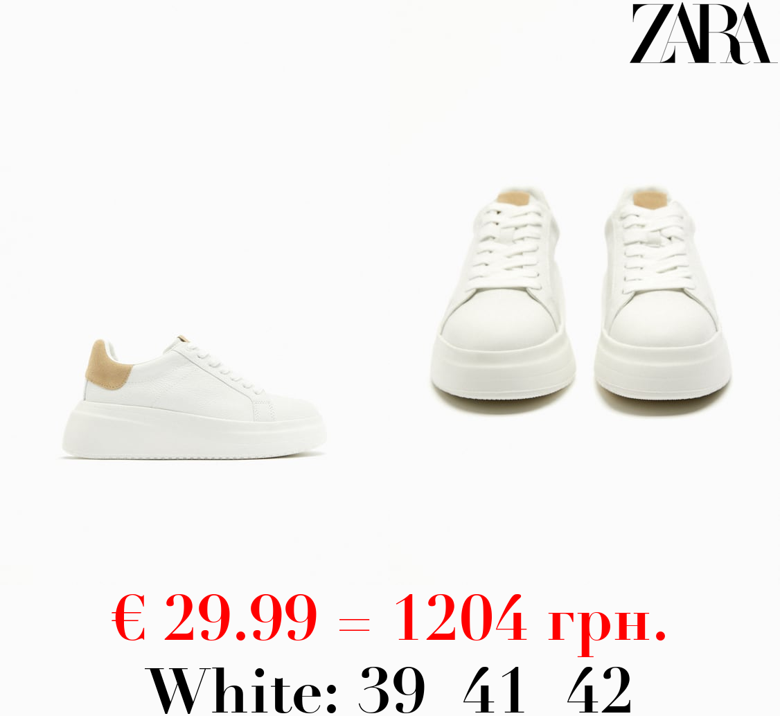 LEATHER PLATFORM TRAINERS