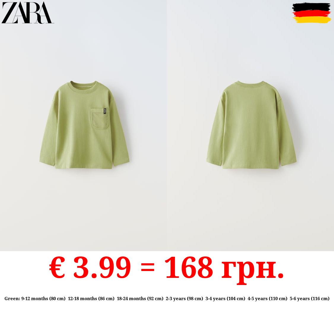 T-SHIRT WITH MESH POCKET