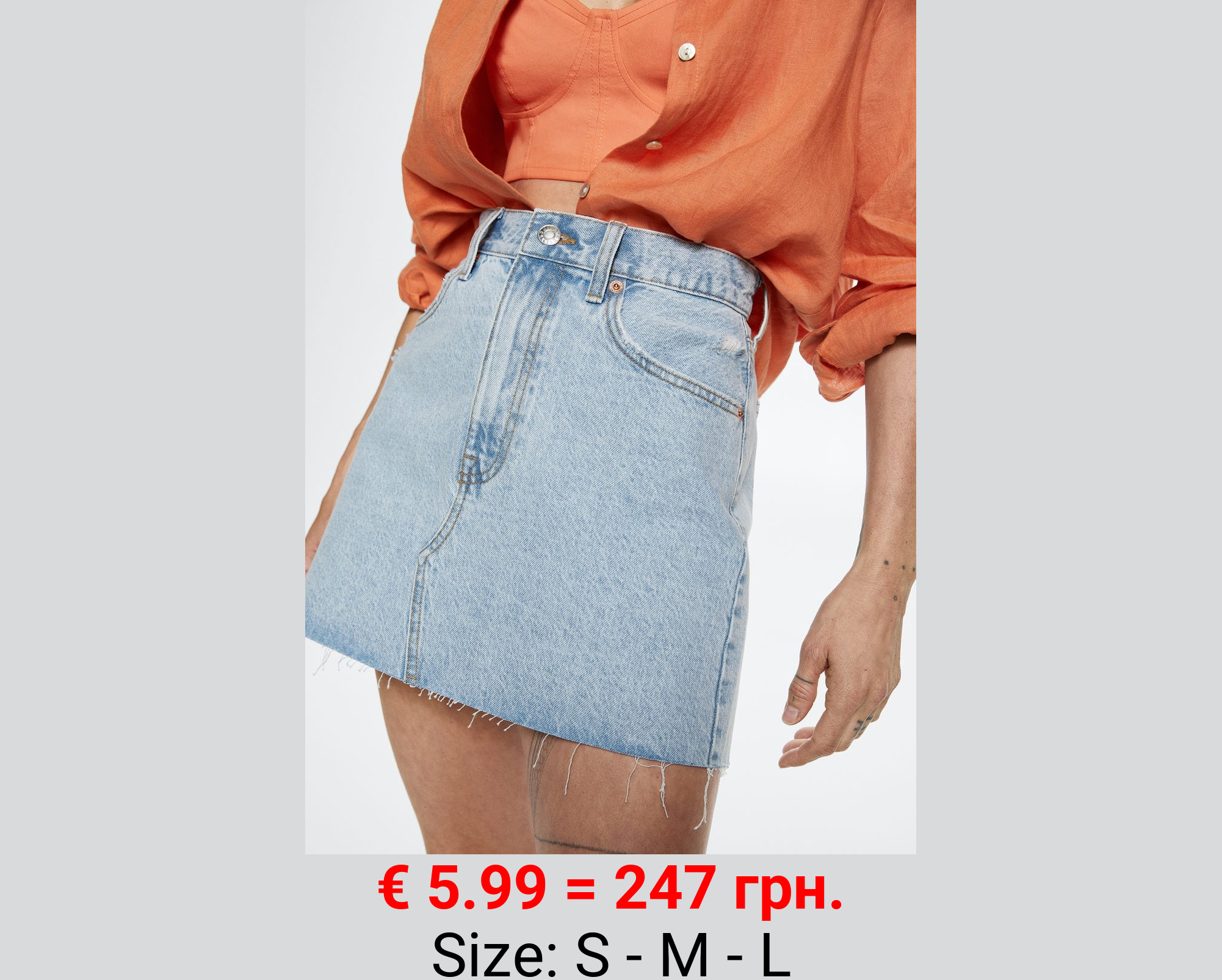 Minifalda vaquera bajo deshilachado