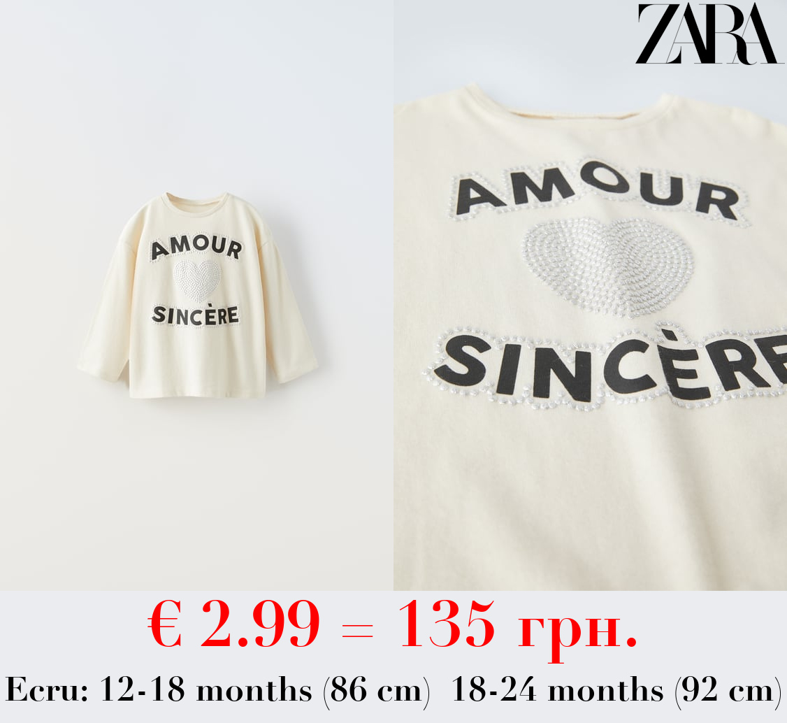 T-SHIRT WITH SHIMMER AND SLOGAN