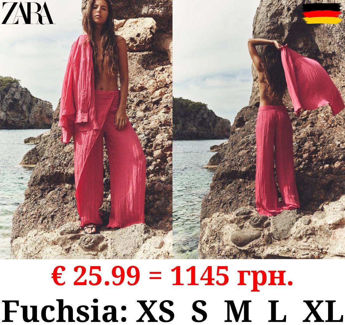 CREASED-EFFECT WRAP TROUSERS