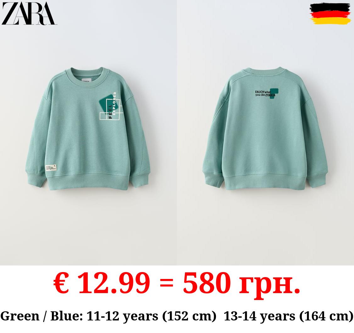 RAISED PRINT SWEATSHIRT