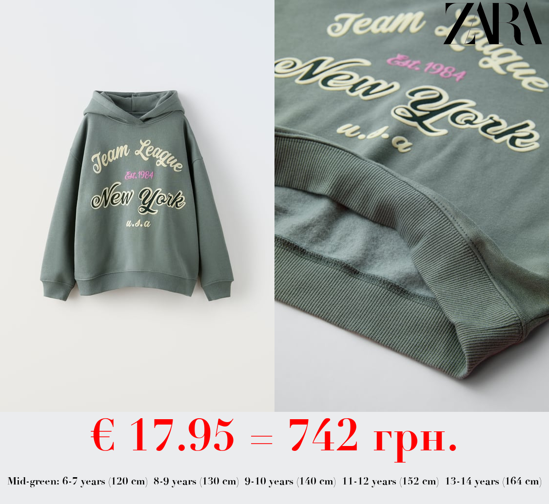 FLOCKED SLOGAN HOODIE