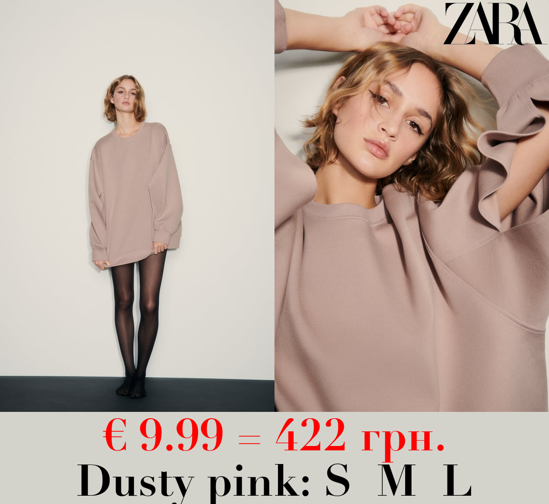 OVERSIZE INTERLOCK SWEATSHIRT WITH OPENING DETAIL