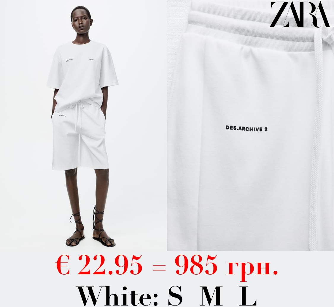 INTERLOCK SLOGAN BERMUDA SHORTS