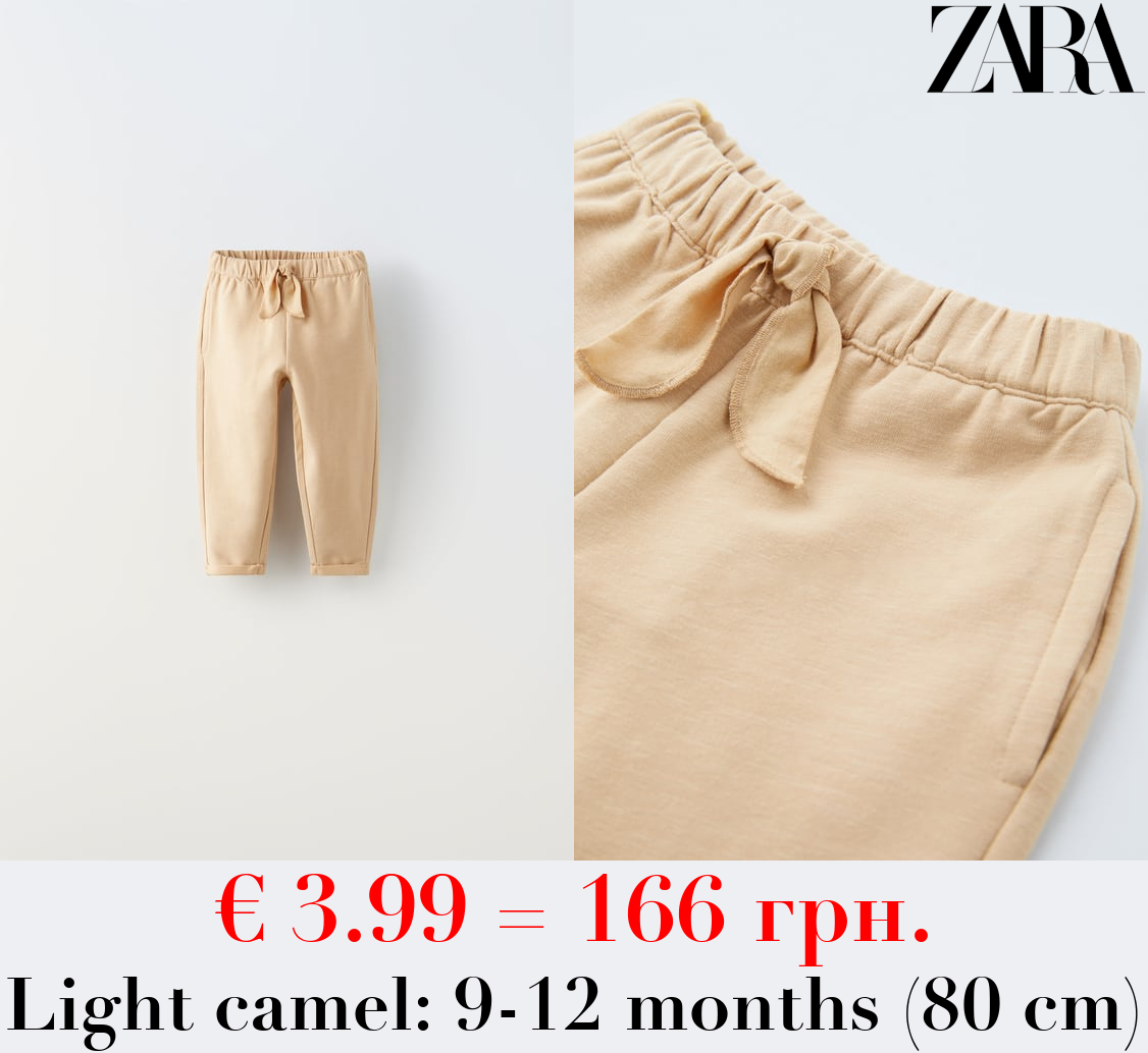 BOHO-STYLE TROUSERS WITH BOW