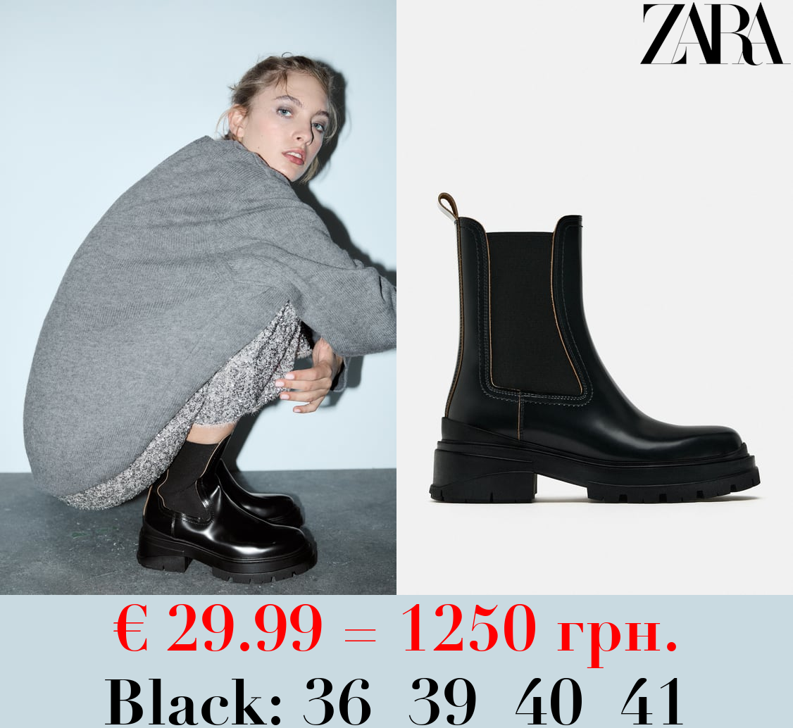 LEATHER TRACK-SOLE ANKLE BOOTS