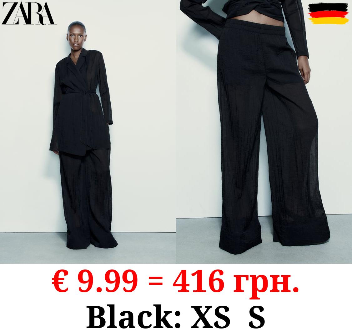 MINIMALIST PALAZZO TROUSERS