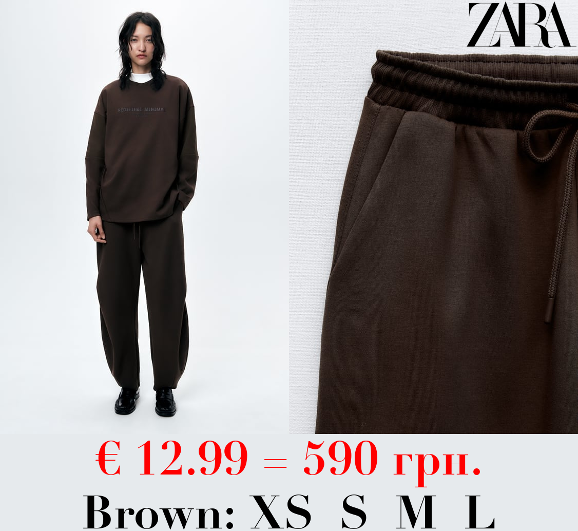 PLUSH JOGGER TROUSERS WITH PLEATS