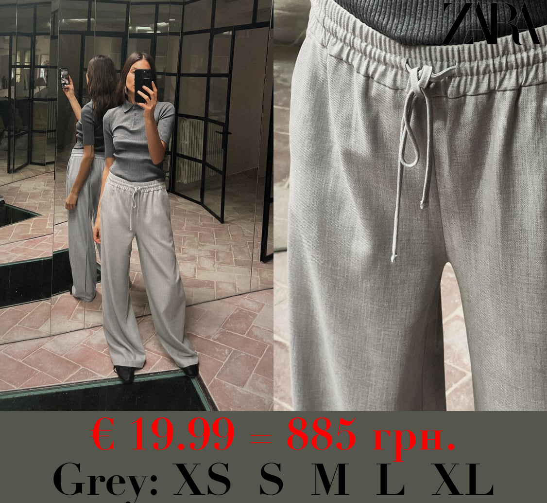 TROUSERS WITH AN ELASTICATED WAISTBAND