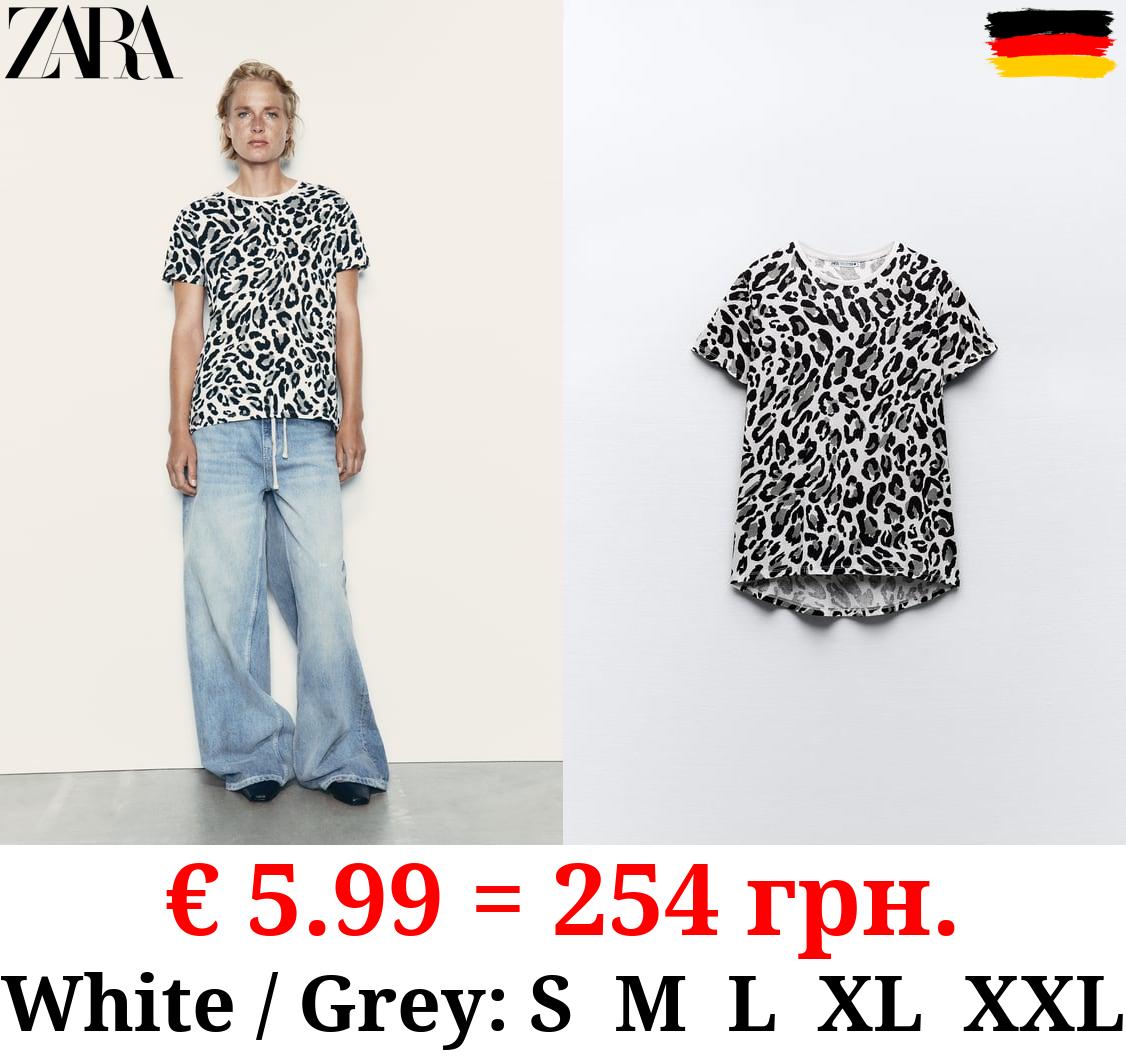 BASIC T-SHIRT WITH ASYMMETRIC HEM