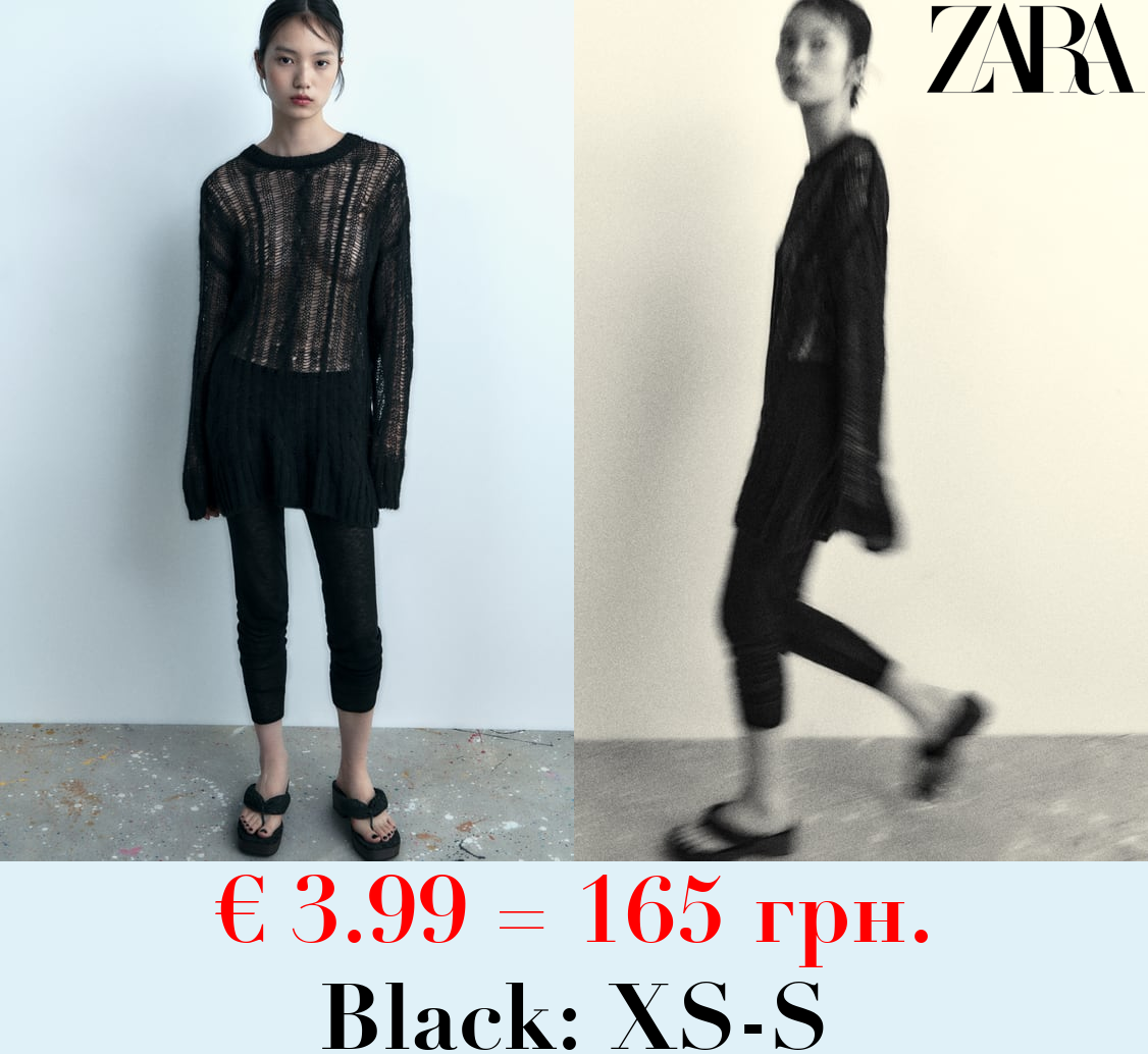 OPEN CABLE-KNIT SWEATER