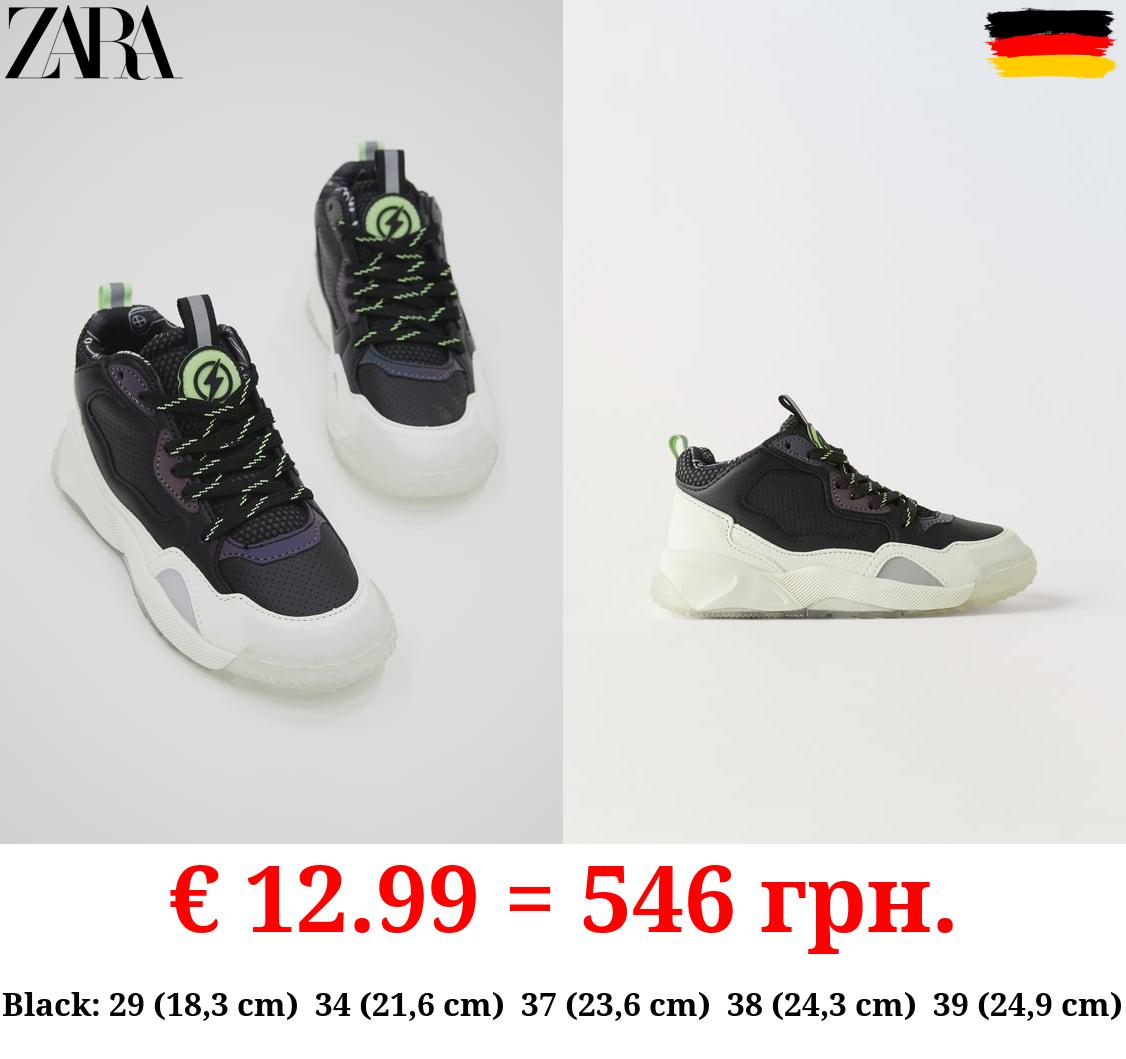 GLOW-IN-THE-DARK HIGH-TOP SNEAKERS