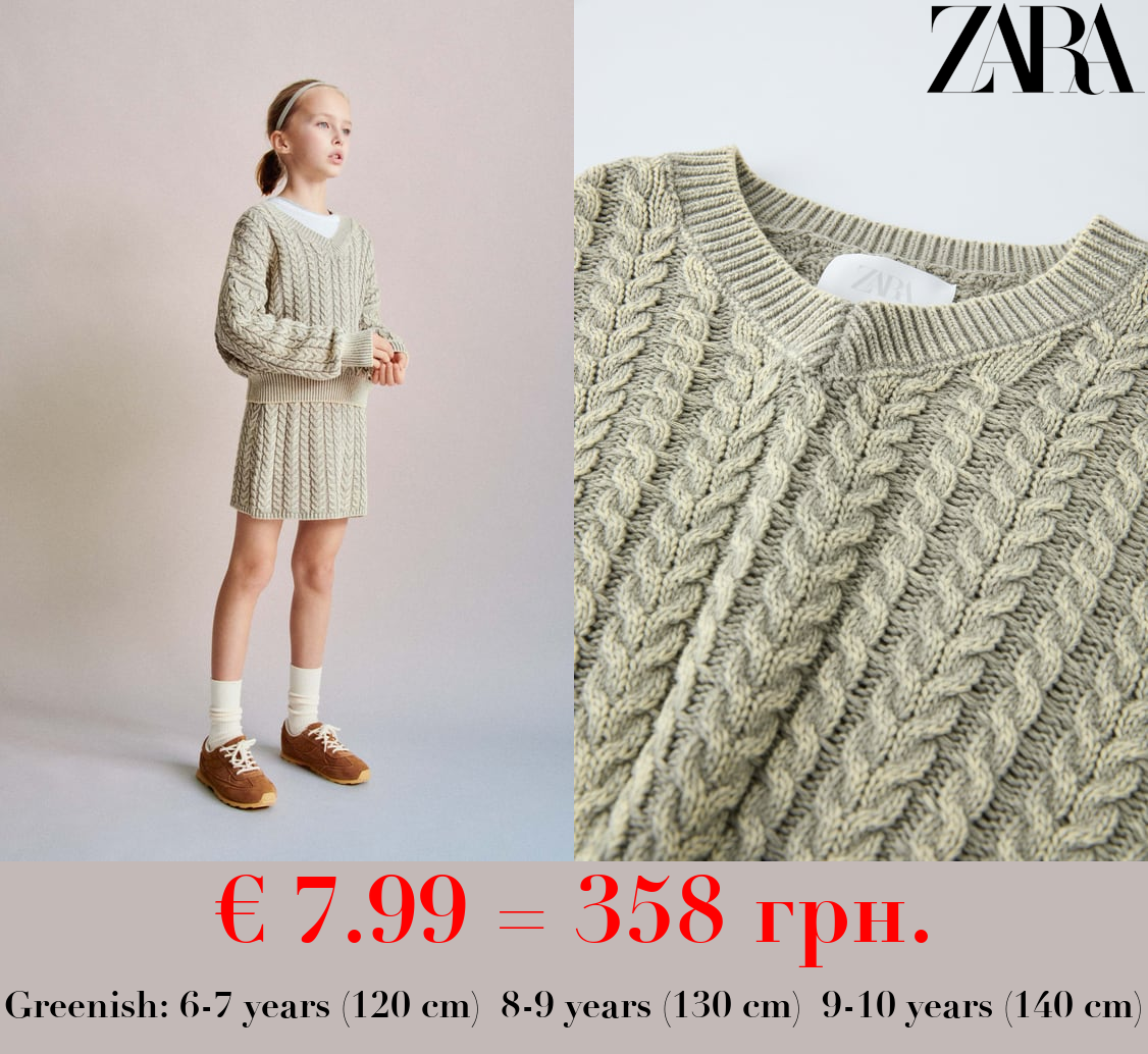 CABLE-KNIT SWEATER