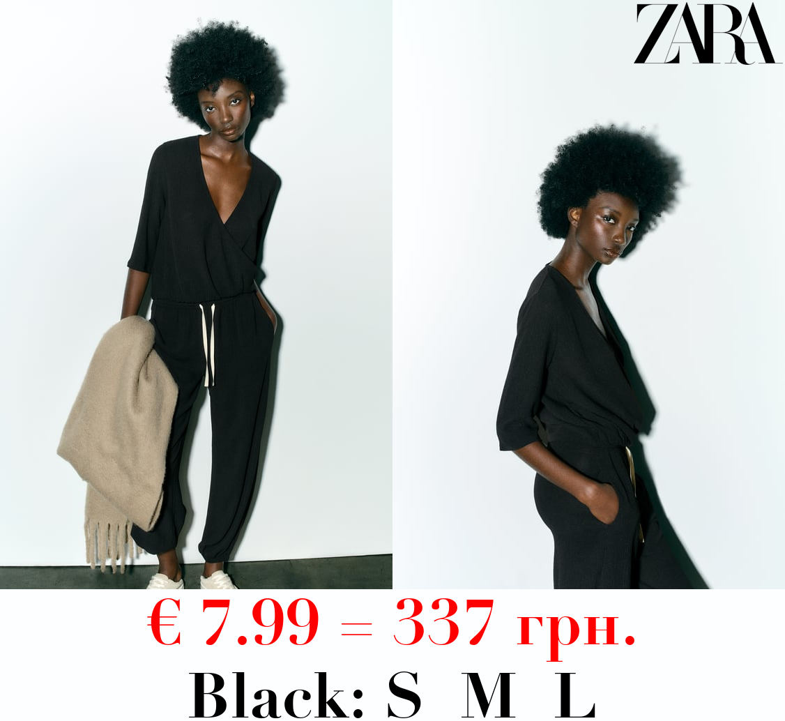 TEXTURED SURPLICE TOP