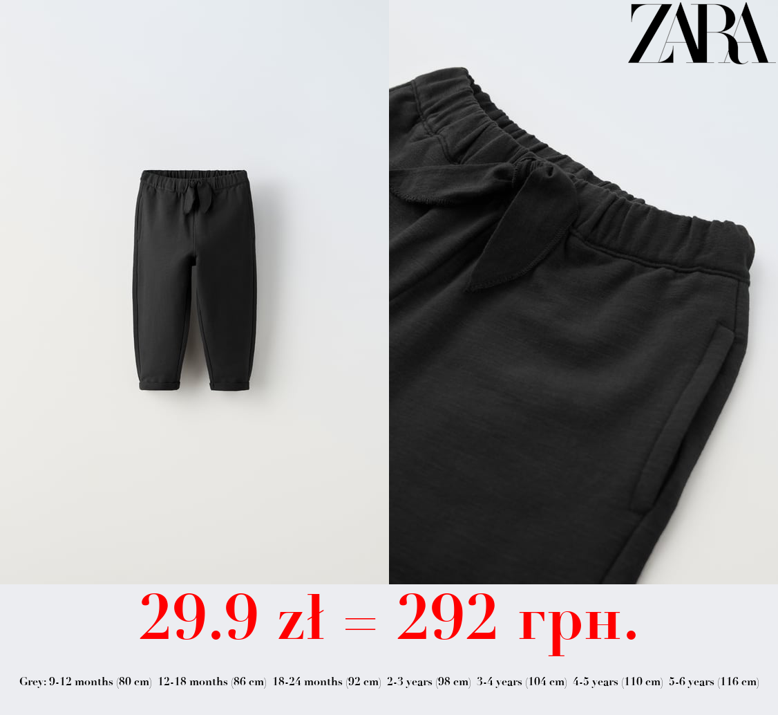 BOHO-STYLE TROUSERS WITH BOW