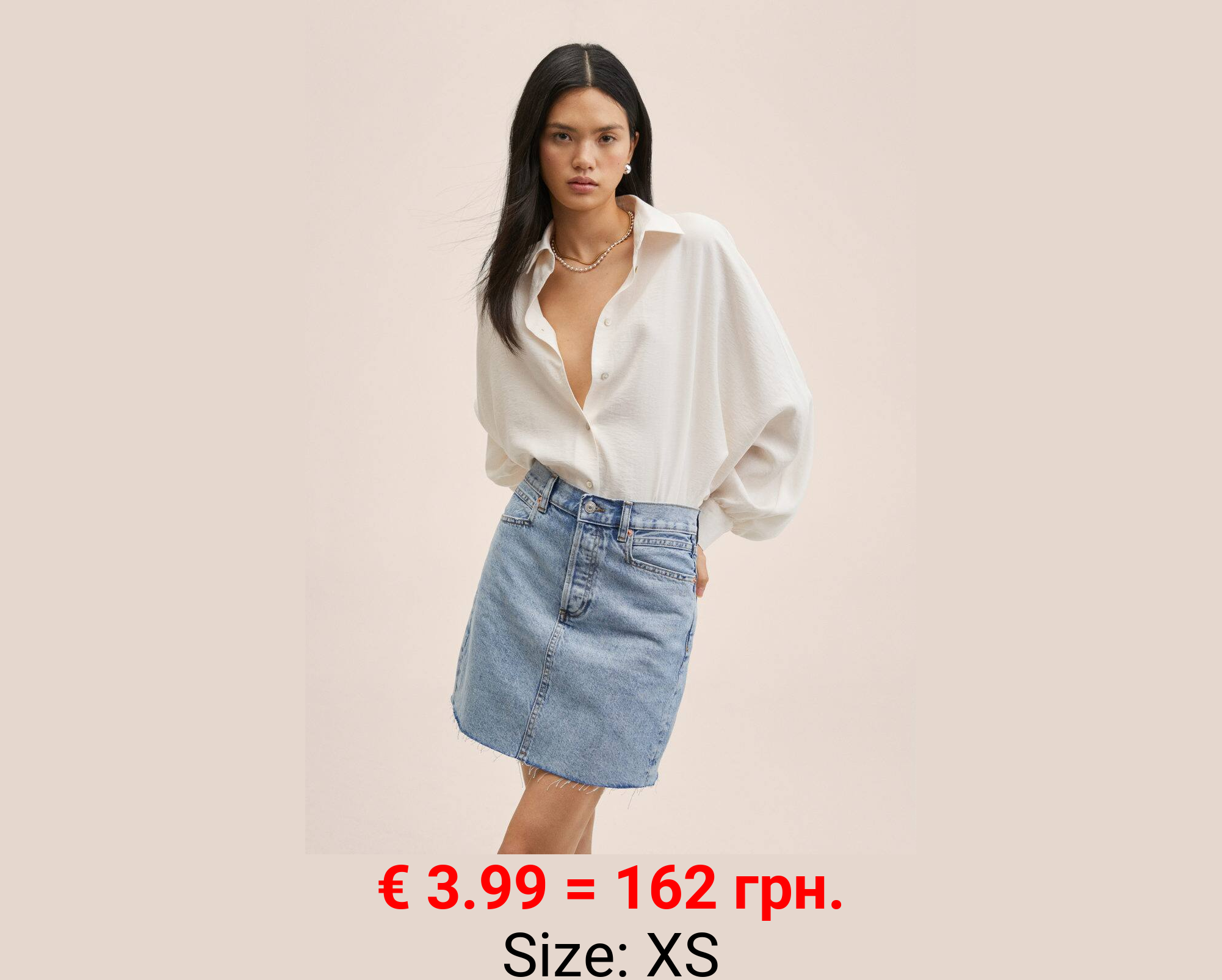 Minifalda vaquera bajo deshilachado