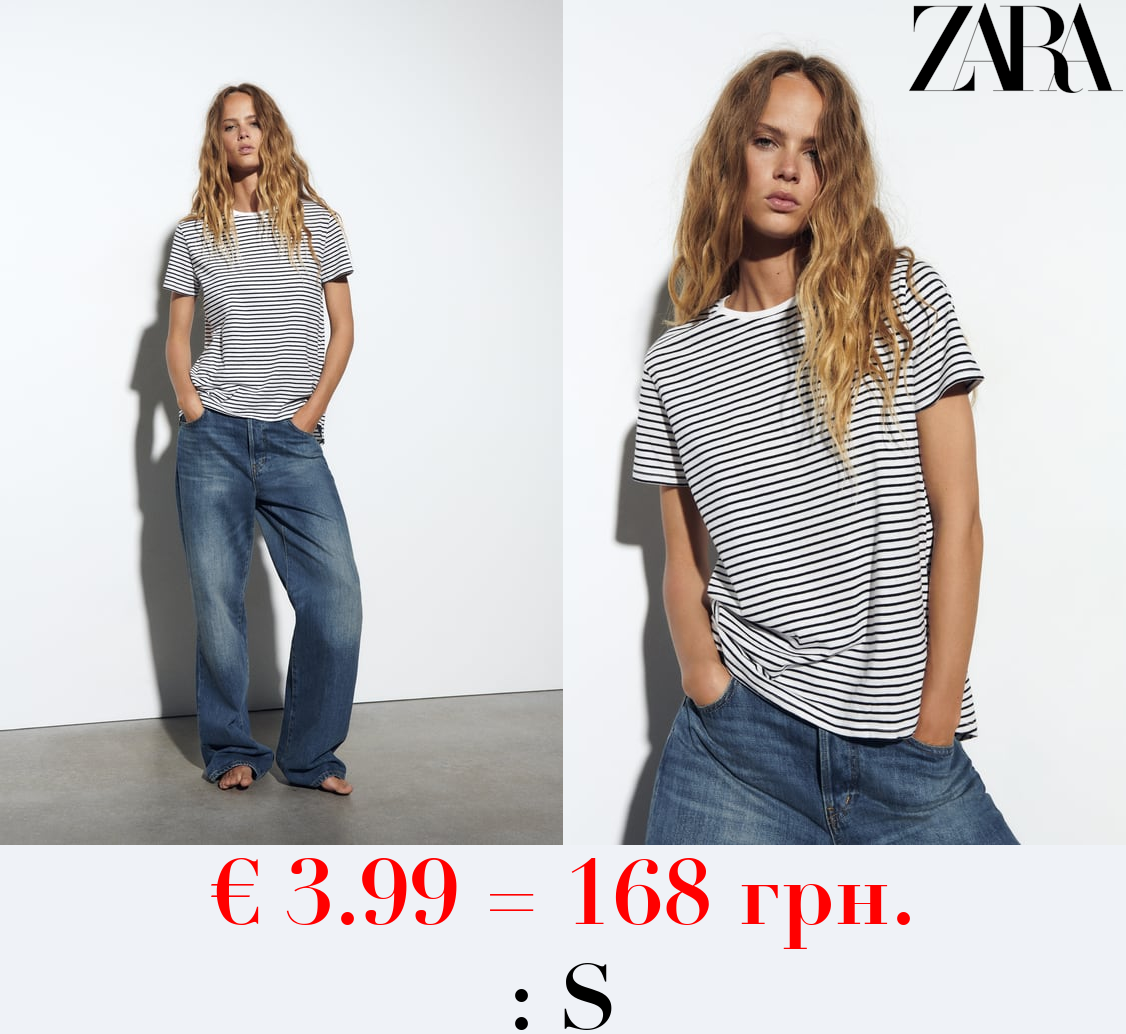 BASIC T-SHIRT WITH ASYMMETRIC HEM