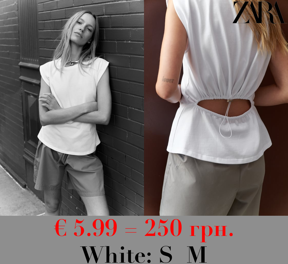 T-SHIRT WITH CUT-OUT AND STOPPER