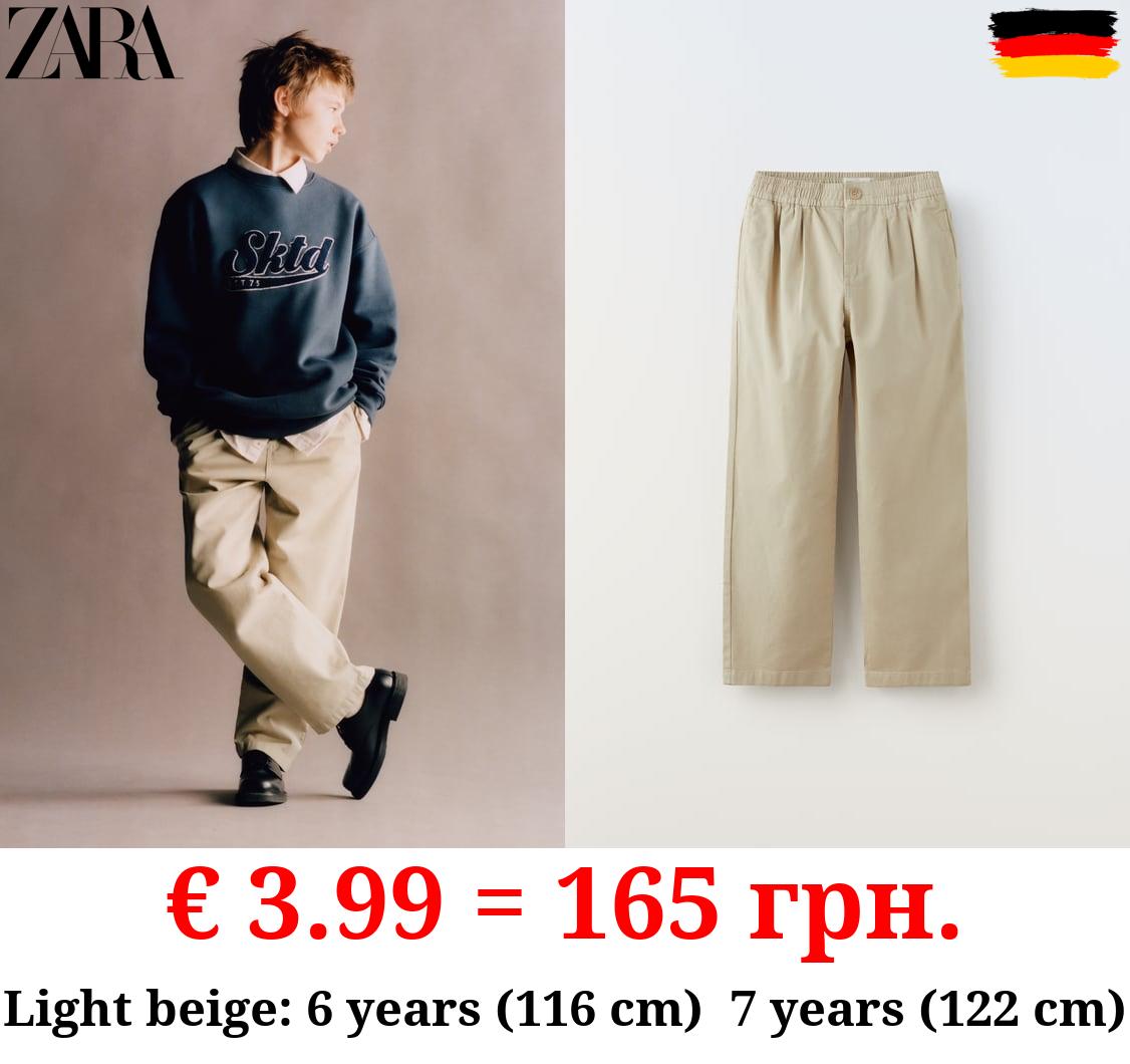 CHINO TROUSERS