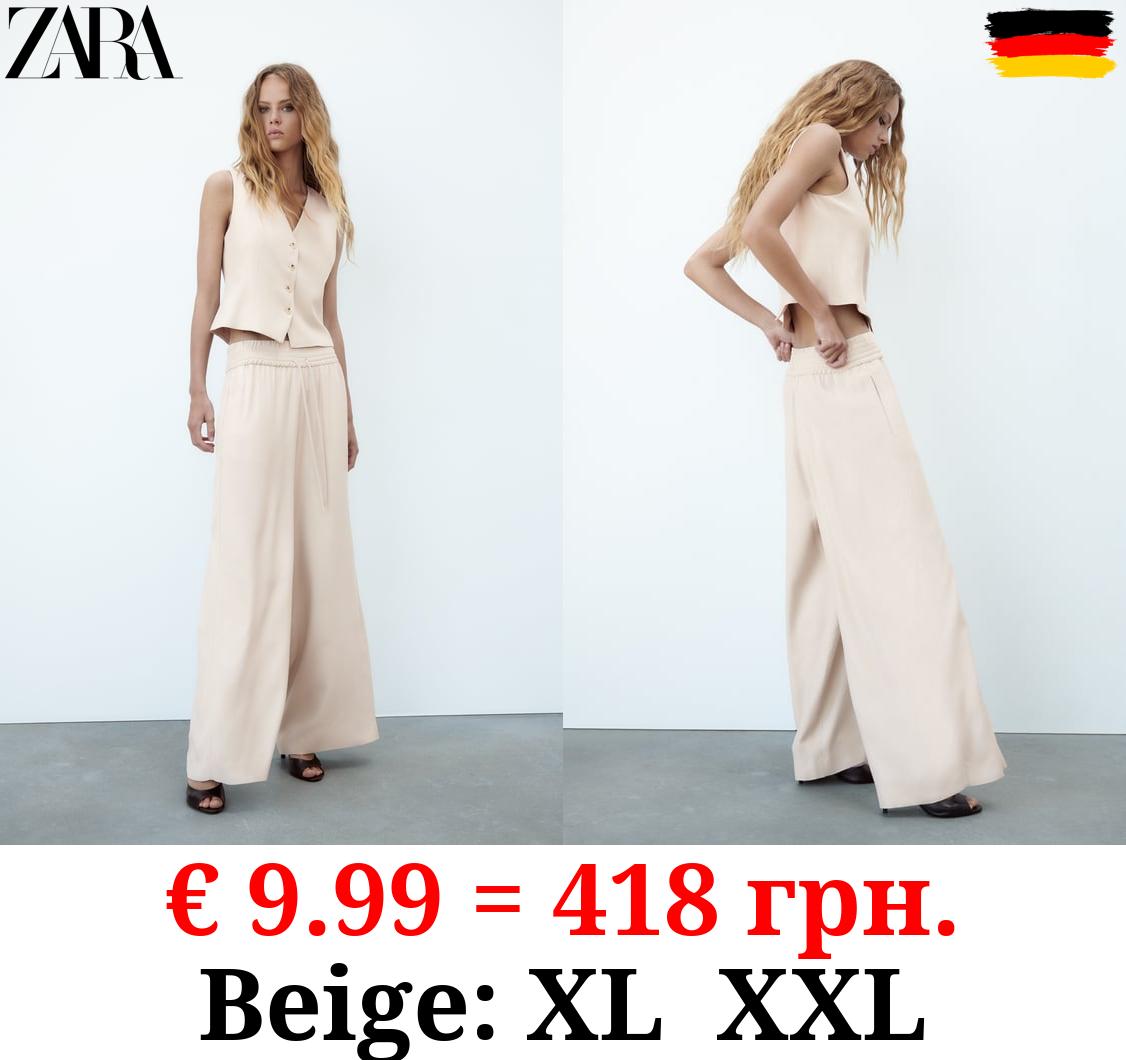 WIDE-LEG FLOWING TROUSERS
