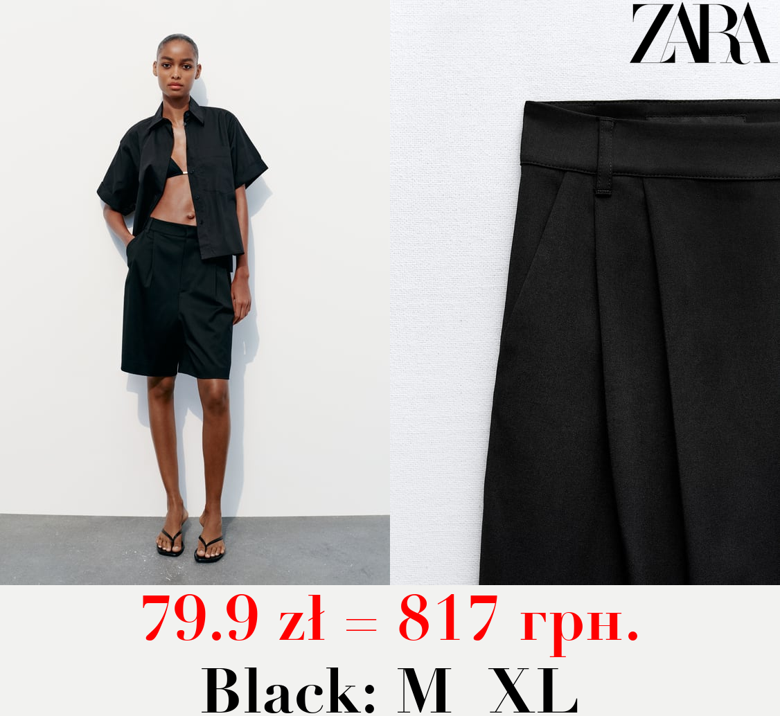 PLEATED BERMUDA SHORTS