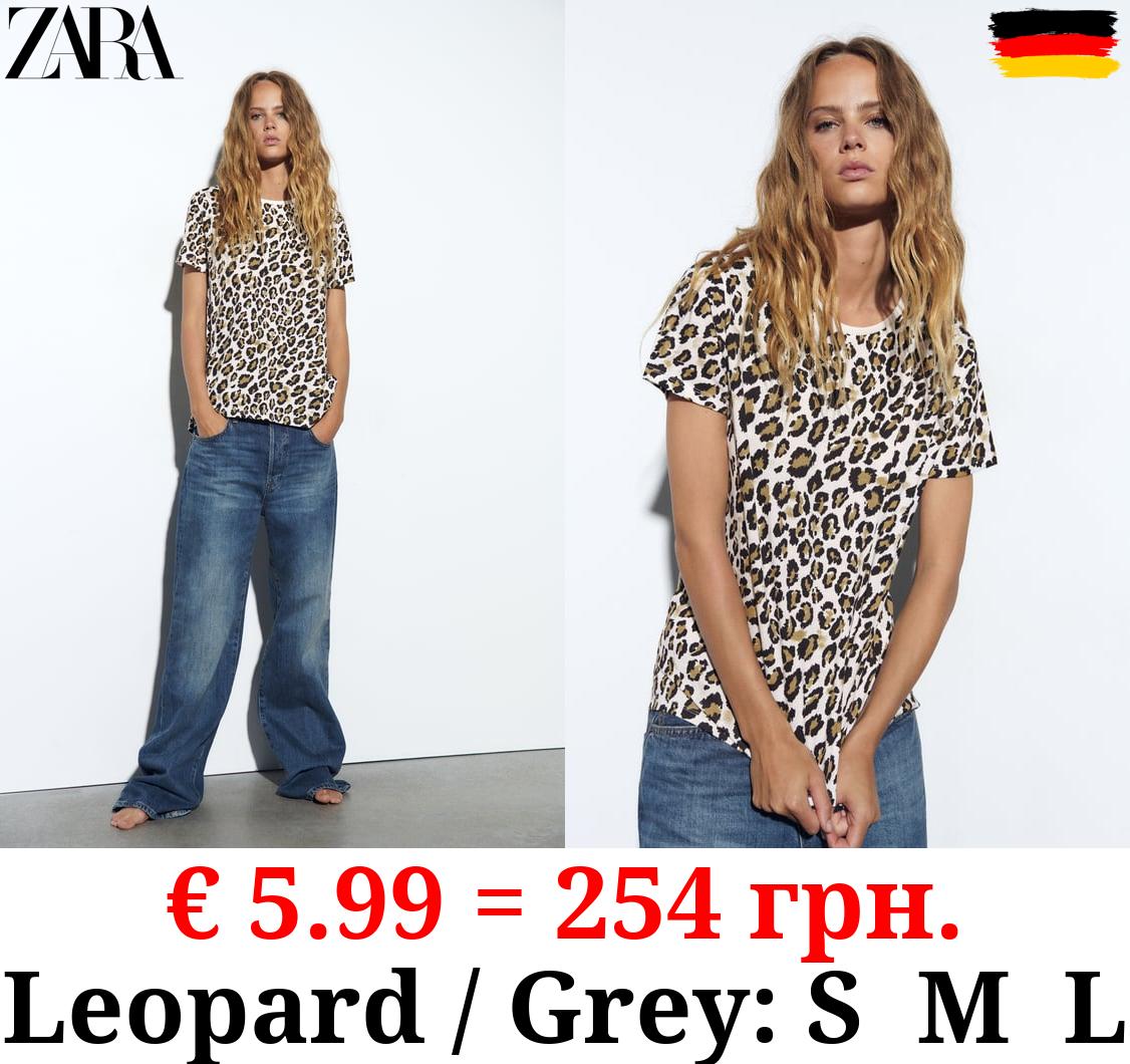 BASIC T-SHIRT WITH ASYMMETRIC HEM